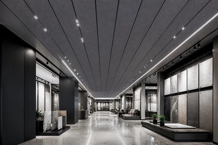 Modern showroom aisle with linear strip ACP sheet ceiling panels